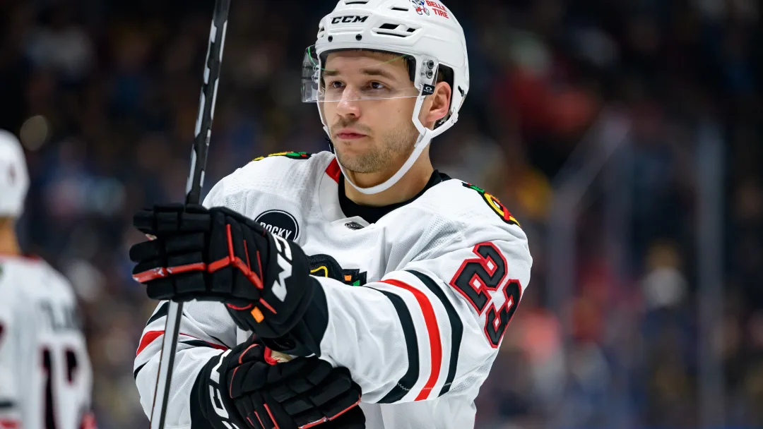 What considerations went into Philipp Kurashev’s decision to sign a $4.5 million, two-year contract extension with the Blackhawks?