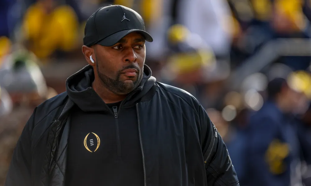 Michigan football coach placed on indefinite suspension during OWI probe