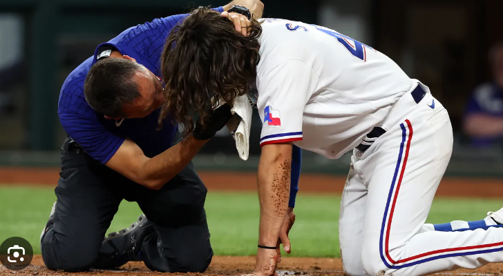 Texas third baseman, will be sidelined for longtime due to surgery on his broken right wrist.