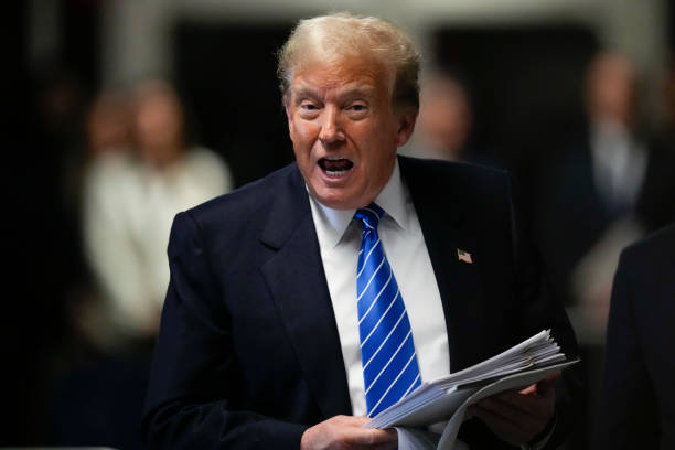 Donald Trump’s and Lou Holtz Controversial Statement on Transgender Athletes Sparks Intense Fan Reaction