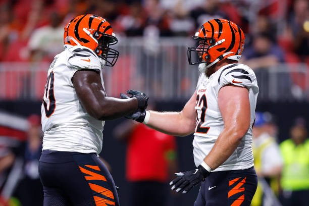 D'Ante Smith #70 and Ben Brown #62 of the Cincinnati Bengals