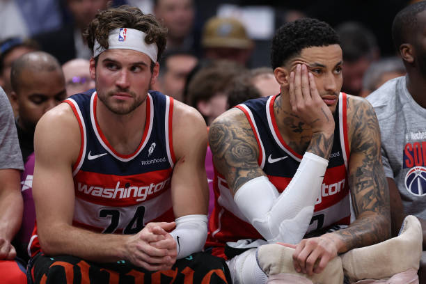 Kyle Kuzma #33 (R) and Corey Kispert #24 (L) of the Washington Wizards